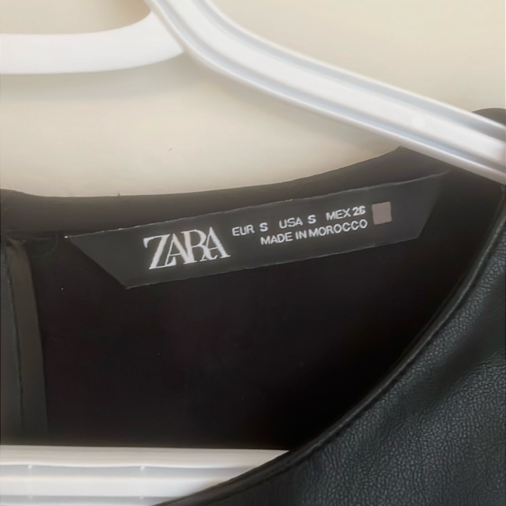 Zara Plu leather tired top.